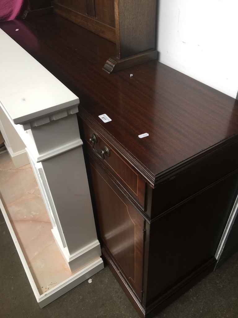 A reproduction mahogany sideboard