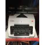 An Olympia commercial typewriter.