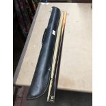 A 2 parts Riley snooker cue in soft case