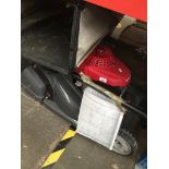 A 19" Honda Petrol lawnmower complete with grass box and workshop manual. Purchased new in 2017at