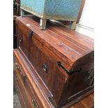 A pine rustic style domed top storage trunk