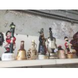 Seven novelty spirit decanters - some filled