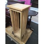 A light wood effect plant stand