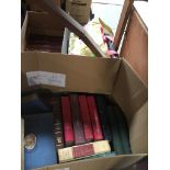 2 boxes of and a bag of books.