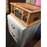 A 2 drawer bedside and a vintage style music system