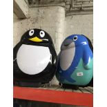 Two children's pull along cases - penguin and a whale