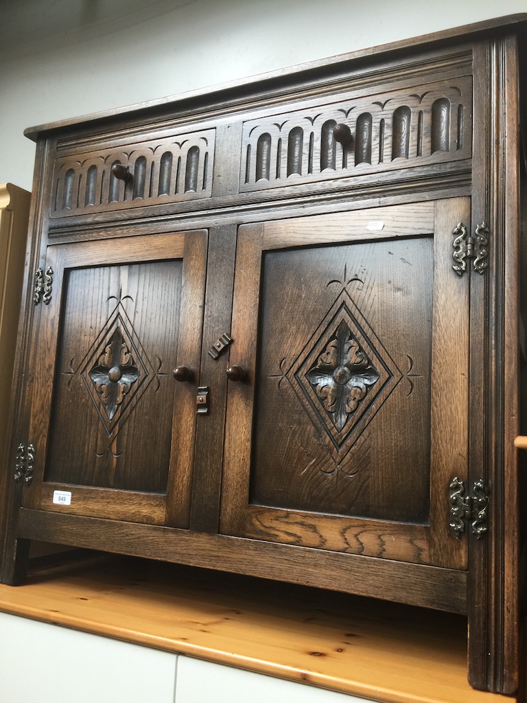 An oak priory style cupboard