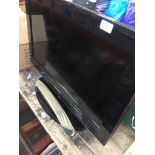 A Samsung 26" LCD TV with remote - model number : LE26A456C2DXXU