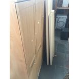 Two modern wardrobes and matching chest of drawers