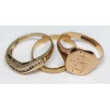 A group of three 9ct gold rings, gross wt. 6.80g.