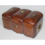 An unusual eastern sailor's mahogany ditty box of shaped form with brass inlaid crucifix, heart