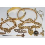 A mixed lot of Victorian and later yellow metal including two bangles, three link bracelets, two