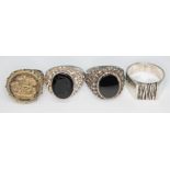 A group of four hallmarked silver rings with various settings, sizes N-U.