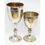 Two hallmarked silver goblets, heights 11cm & 15cm, wt. 4 1/2oz.