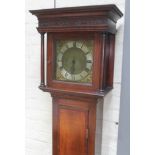 A brass dial 30 hour long case clock with oak and mahogany case, height 192cm.