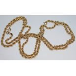 Two 9ct gold rope twist chains, each with 9ct gold import marks, lengths 40cm & 41cm, gross wt. 9.