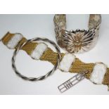 A mixed lot of jewellery comprising a yellow metal bracelet set with carved colourless paste panels,