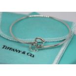 A Tiffany Elsa Peretti bangle, marked 'Tiffany & Co Peretti 925 Spain', diam. approx. 5.5cm.