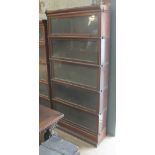 An early 20th century five part glazed sectional bookcase by Globe-Wernicke, printed maker's mark,
