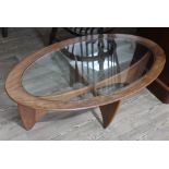 A G-Plan teak Astro coffee table of oval form, length 122cm.