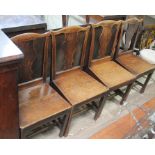 A set of four 18th century oak chairs.