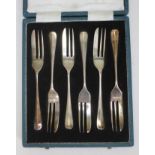 A cased set of six hallmarked silver cake forks by Mappin & Webb.