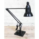 A Herbert Terry & Sons black anglepoise lamp with bakelite Crabtree switch and two step base.