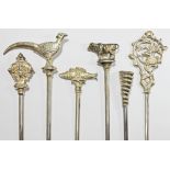 A matched set of six silver plated skewers, each with animal finials, the fish, bull, snake and