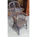 A 19th century ash spindle and pierced slat back Windsor chair with crinoline stretcher, width 52cm,