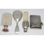 A mixed lot comprising a hallmarked silver vesta, a cut glass scent bottle with hallmarked silver