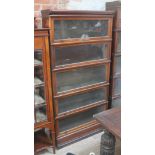 An early 20th century five part glazed sectional bookcase by Globe-Wernicke, interior label, width