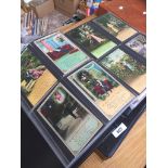 An album containing approx 240 vintage postcards