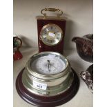 A Robert Blandford quartz carriage clock and a barometer