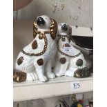 Pair of 19th century Staffordshire pot dogs with gold paint