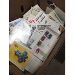 A box of first day covers and pictures