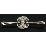 An Art Deco diamond cluster bar brooch, length 47mm, unmarked, gross wt. 4.42g.