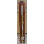 A modern gilt brass stick barometer inscribed 2004 "Sidric", length 121cm.