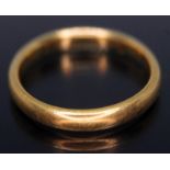 A hallmarked 22ct gold wedding band, wt. 5.33g, size Q.