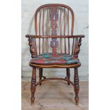 A 19th century ash Windsor chair with crinoline stretcher.