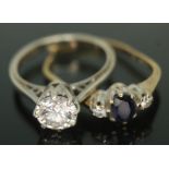 A hallmarked 9ct white gold ring set with a cubic zirconia size J and another ring set with two
