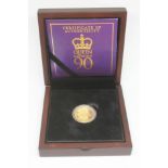 Elizabeth II 2016 gold proof £1 coin, 90th birthday, limited edition number 33/995, boxed with