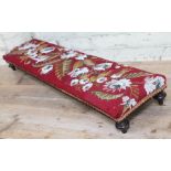 A Victorian beadwork footstool, length 106cm.