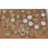 A collection of 31 gold plated pocket watches (spares and repairs) and another four gold plated