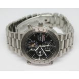 A vintage Seiko Sports 150 Chronograph quartz stainless steel wristwatch with signed black dial,