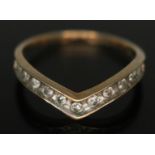 A hallmarked 9ct gold diamond set wishbone ring, gross wt. 1.70g, size N.