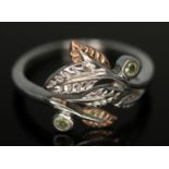 A contemporary Arts & Crafts Welsh silver ring by Clogau, naturalistically formed as leaves with