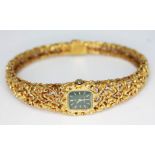 A 1967 ladies hallmarked 18ct gold Omega bracelet watch, reference 8180, with green signed dial,