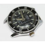 A vintage Cardinal Submarine Super Waterproof diver's wristwatch with signed black dial, lumed hands