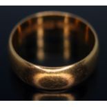 A hallmarked 22ct gold wedding band, wt. 6.57g, size Q.