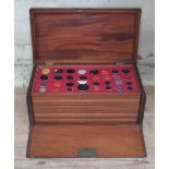 A Georgian mahogany specimen box housing an extensive collection of wax intaglio seal impressions,